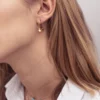 boucles doreilles creoles confettis acier dore portees 380x443 crop center